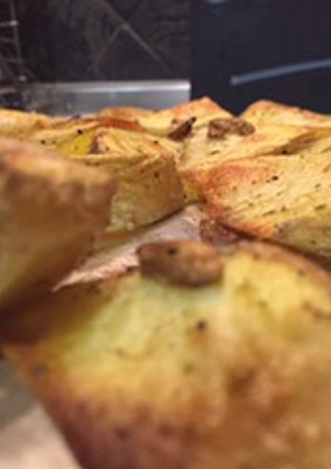 Una foto de Cuñas de patata al horno