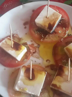 Una foto de Tomate aliñado