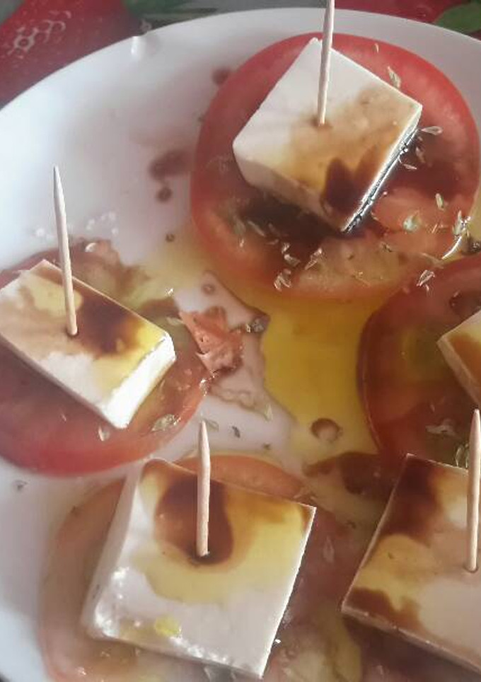 Una foto de Tomate aliñado
