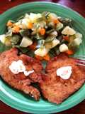 Filetes de pechuga rebozadas con verduras cocidas