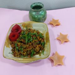 A picture of Bitter gourd with onion masala.