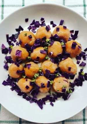 A picture of Sweet Potato Gnocchi with Melting Parmesan Center.