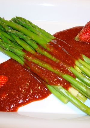 A picture of Asparagus with Strawberry Dressing.