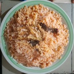 Party Jollof rice with stockfish A picture of Party Jollof rice with stockfish.