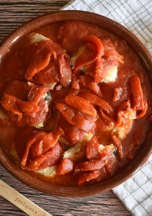 Una foto de Bacalao fresco con tomate y pimientos
