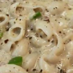 A picture of White sauce Macaroni pasta.