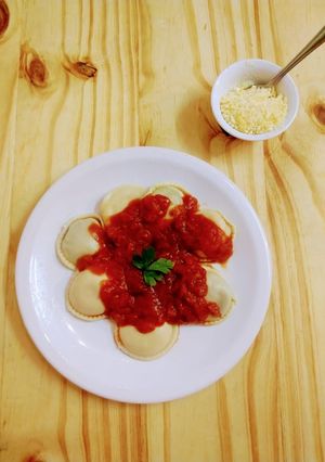 Una foto de Sorrentinos de calabaza y de verdura