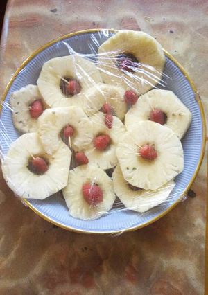 A picture of Pineapple and strawberry salad.
