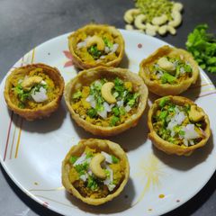 A picture of Chatpata sprouted moong and Aaloo katori.