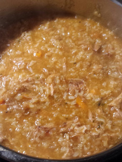 A picture of Beef rice tomato soup.