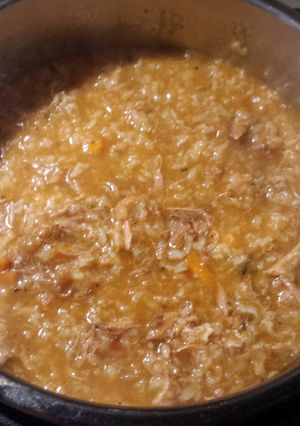 A picture of Beef rice tomato soup.