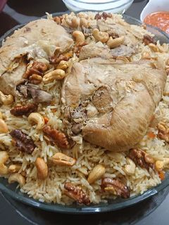 صورة لوصفة كبسة بمرق الدجاج