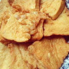 A picture of Fried bread with egg.