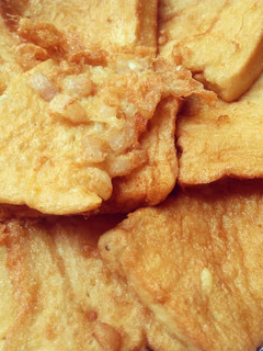A picture of Fried bread with egg.