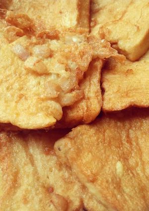 A picture of Fried bread with egg.