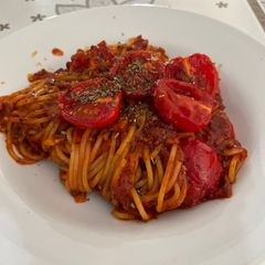A picture of Pasta Pomodoro with bacon.