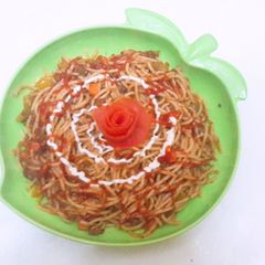 A picture of Spaghetti with sauce.