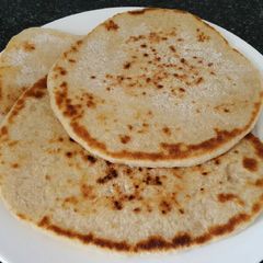 A picture of Sourdough Flat bread baked in the pan.