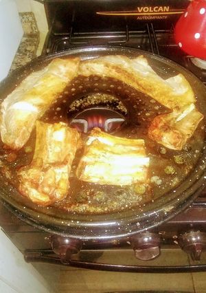 Una foto de Asado al parrigas de chancho del 25 ultra simple
