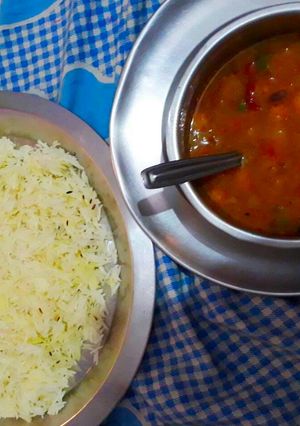 A picture of Jeera Rice with chana masala.