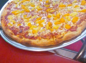 Una foto de Pizza hawaiana
