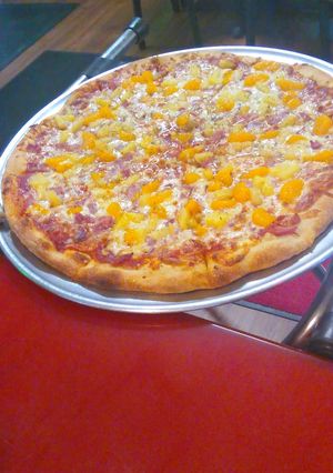 Una foto de Pizza hawaiana