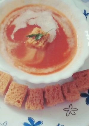 A picture of Carrot and tomato soup.