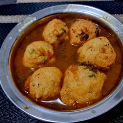 Tomato Rasam vada A picture of Tomato Rasam vada.