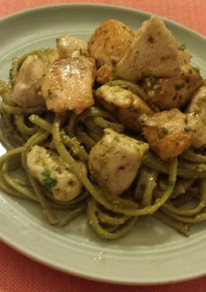 A picture of Salmon/Chicken with Pesto Fettuccine.
