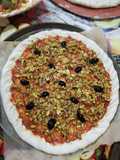 Pizza aux poulet hachée