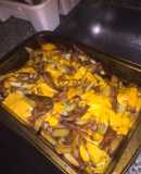 Papas fritas con cheddar