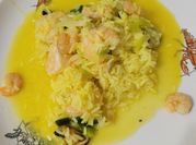 Una foto de arroz con choritos y azafrán