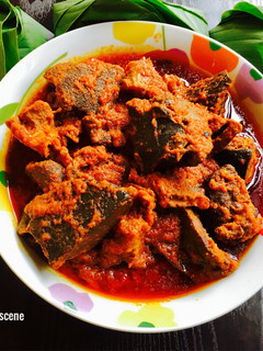 A picture of Assorted Meat stew and Leaf Rice.