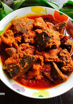 A picture of Assorted Meat stew and Leaf Rice.