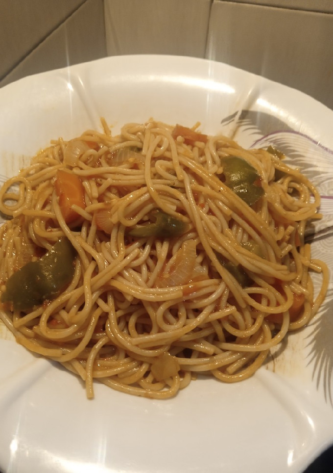 A picture of Palmoil spaghetti jallof.
