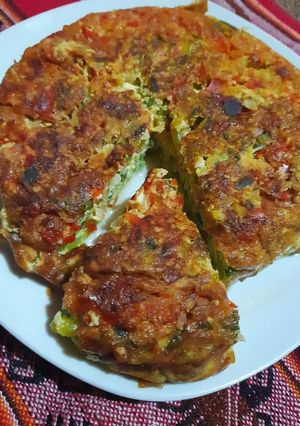 Una foto de Tortilla de zapallito 🧅🌶