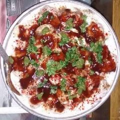 A picture of Bread dahi vade or vade.