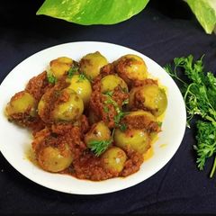 A picture of Gunda nu shak (Stuffed Gumberry curry).