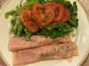 Una foto de elotes con jamon