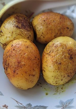 A picture of Boiled eggs pan fried WD tumeric powder.