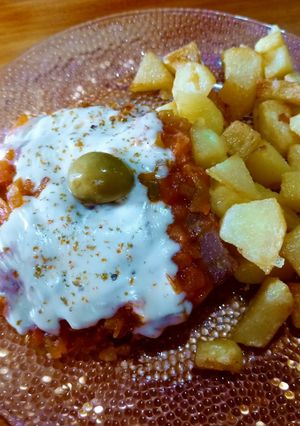 Una foto de Matambre a la pizza con papas😋😋