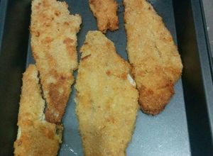 Una foto de Merluza apanada al horno