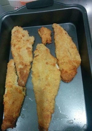 Una foto de Merluza apanada al horno