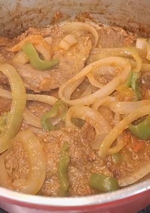 Foto de Bife com Pimentão e Cebolas