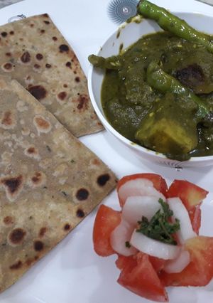 A picture of Btata palak curry.