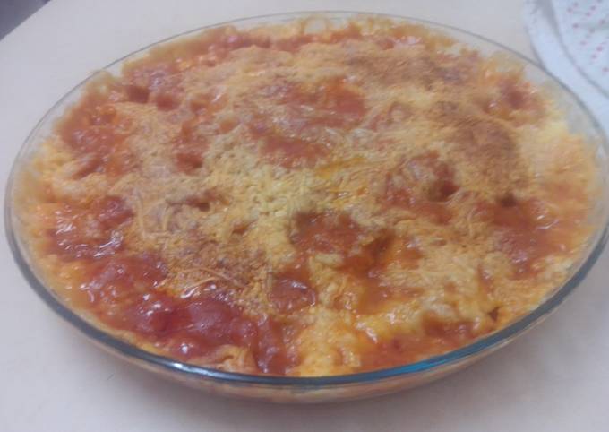 Foto principal de Tortilla de tomate solis, nata, y queso rallado