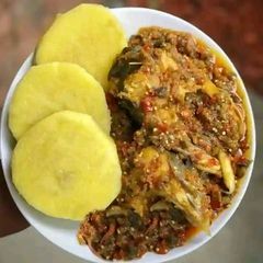 A picture of Yam and garden egg sauce.