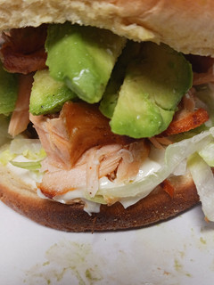 A picture of Smoked salmon sandwich w/avocado.