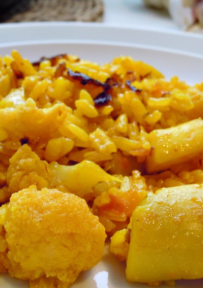 Una foto de Arroz con sepia y coliflor