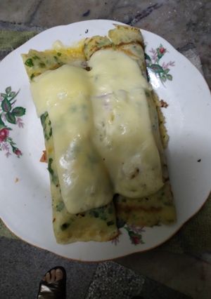 Una foto de Panqueques con ajo y pereji